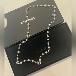 Like new in box Chanel long station necklace in silver tone, pearl and crystals